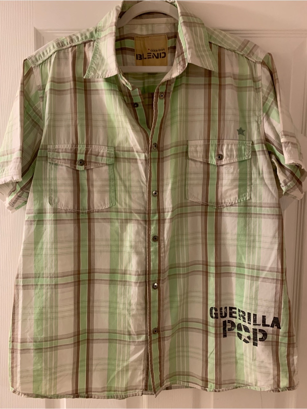 Blend short-sleeved plaid shirt featuring "Guerilla Pop" graphics
